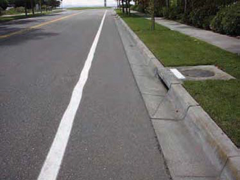 Inlet Located outside of bikeway